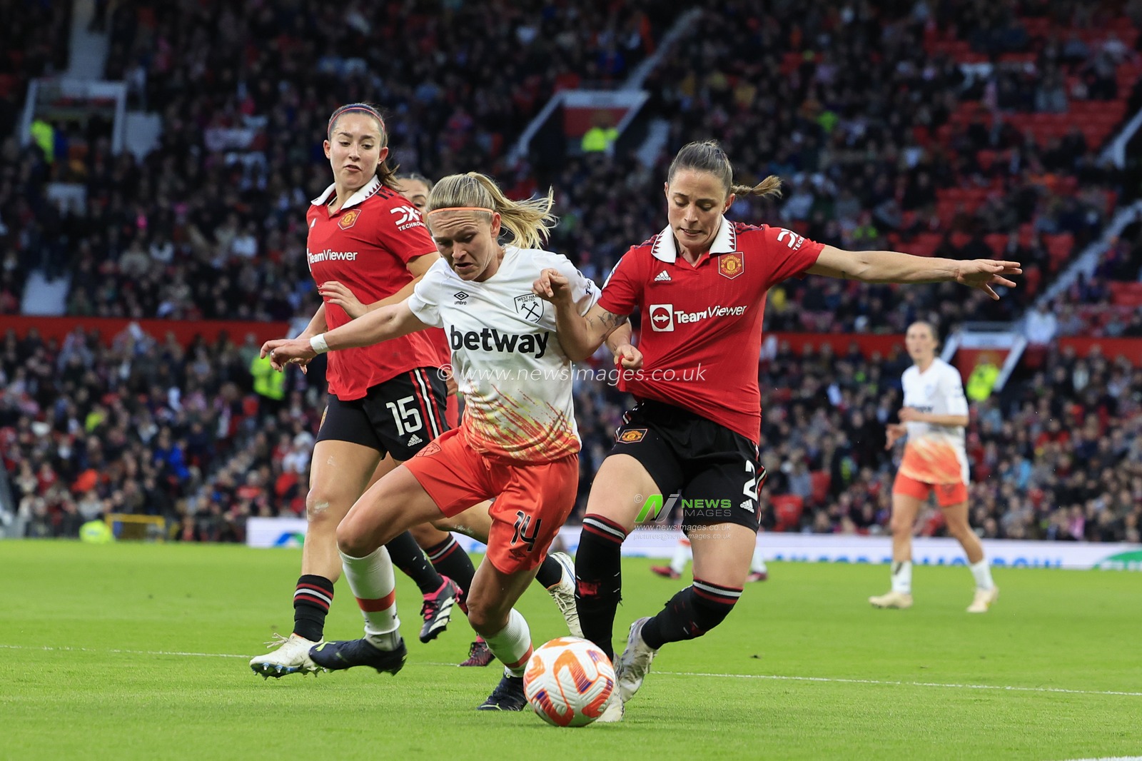 Ona Batlle #2 of Manchester United and Amalie Threstrup #14 of West Ham United challenge for the ball during the FA Women's Super League match Manchester United Women vs West Ham United Women at Old Trafford, Manchester, United Kingdom, 25th March 2023

(Photo by Conor Molloy/News Images)