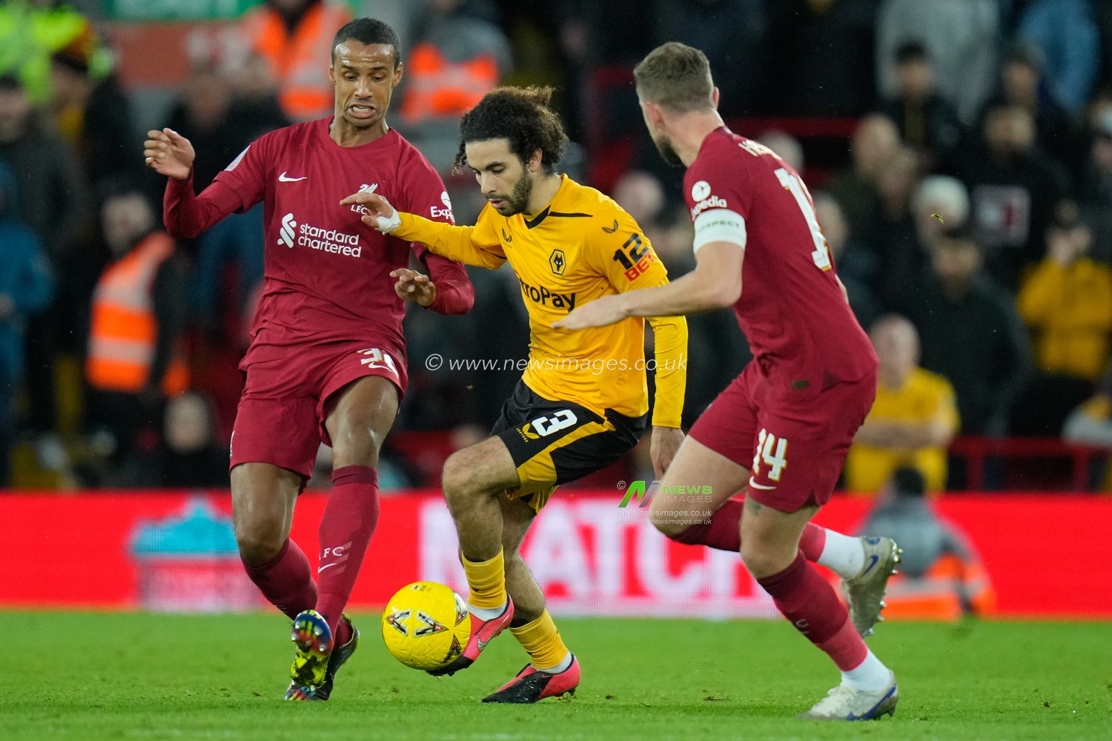 Joel Matip #32 of Liverpool competes for the ball with Rayan AÃ¯t-Nouri #3 of Wolverhampton Wanderers during the Emirates FA Cup Third Round match Liverpool vs Wolverhampton Wanderers at Anfield, Liverpool, United Kingdom, 7th January 2023

(Photo by Steve Flynn/News Images)