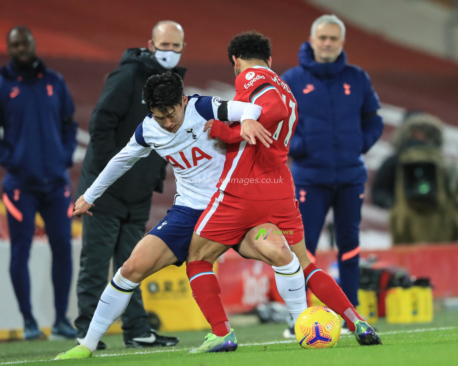 Mohamed Salah #11 of Liverpool and Son Heung-Min #7 of Tottenham Hotspur dual for the ball