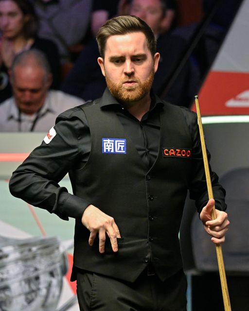 Jak Jones reacts while he looks over the table, during the Cazoo World Championships 2024 Final at Crucible Theatre, Sheffield, United Kingdom, 5th May 2024

(Photo by Cody Froggatt/News Images)