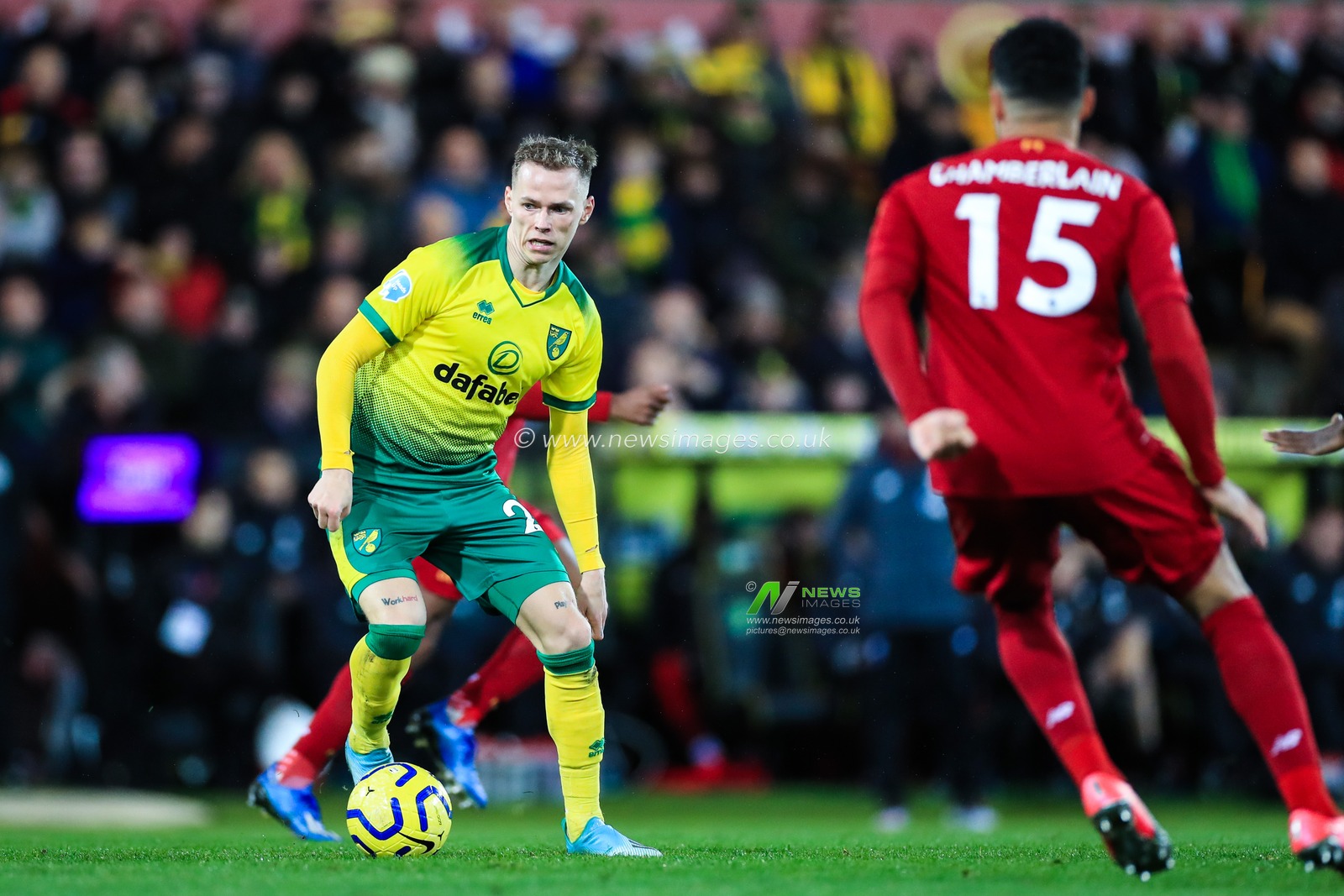 15th February 2020, Carrow Road, Norwich, England; Premier League, Norwich City v Liverpool : Ondrej Duda (25) of Norwich City tries to find a way passed Alex Oxlade-Chamberlain (15) of Liverpool