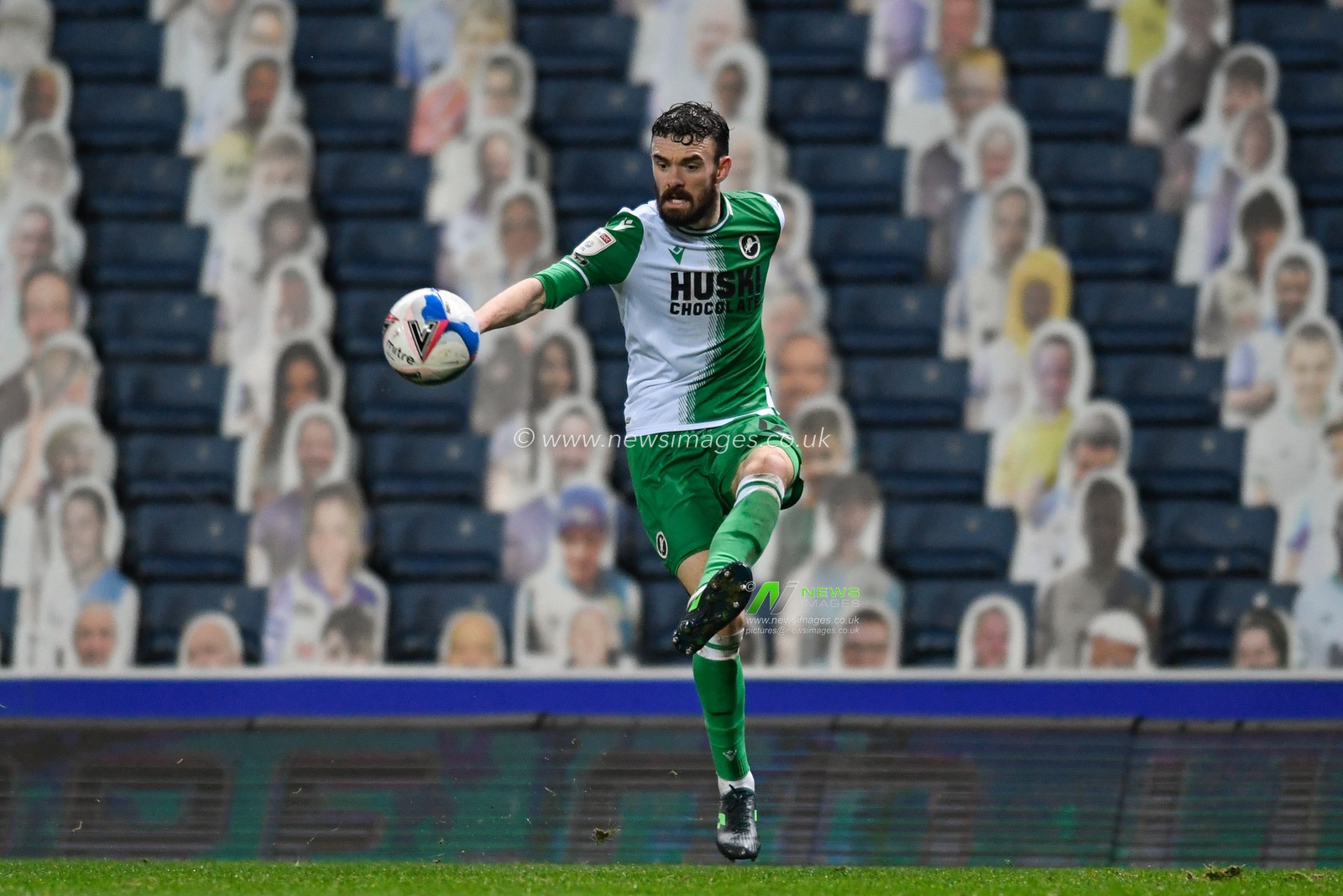 Scott Malone #14 of Millwall controls the ball