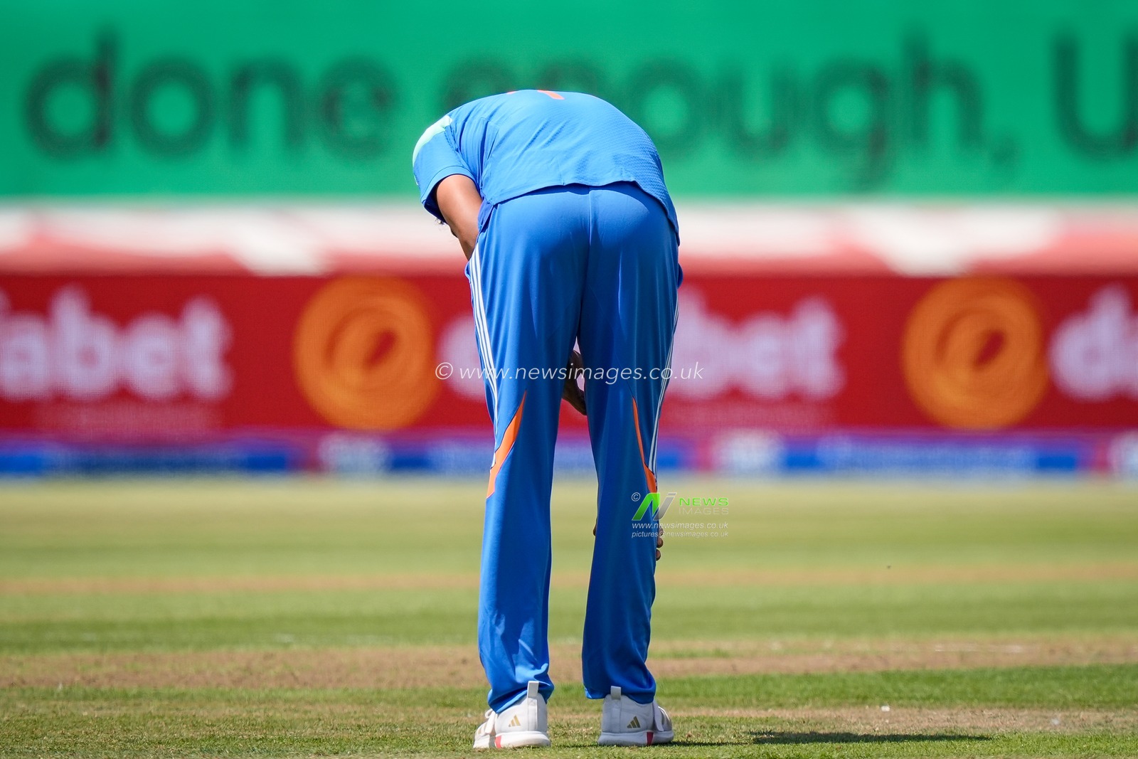 Gurnoor Brar of India clutches his leg with a potential injury and receives treatment during the 1st Metro Bank ODI match England vs India at Edgbaston, Birmingham, United Kingdom on 14 July 2026

(Photo by Maynard Manyowa/News Images)