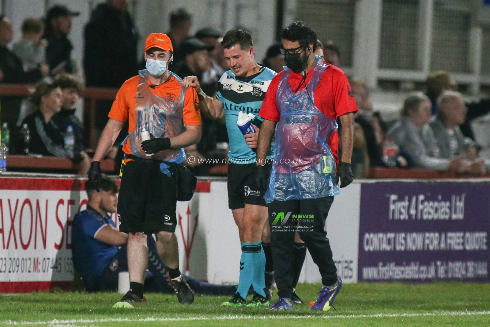 Jamie Shaul (29) of Hull FC is helped off the pitch
