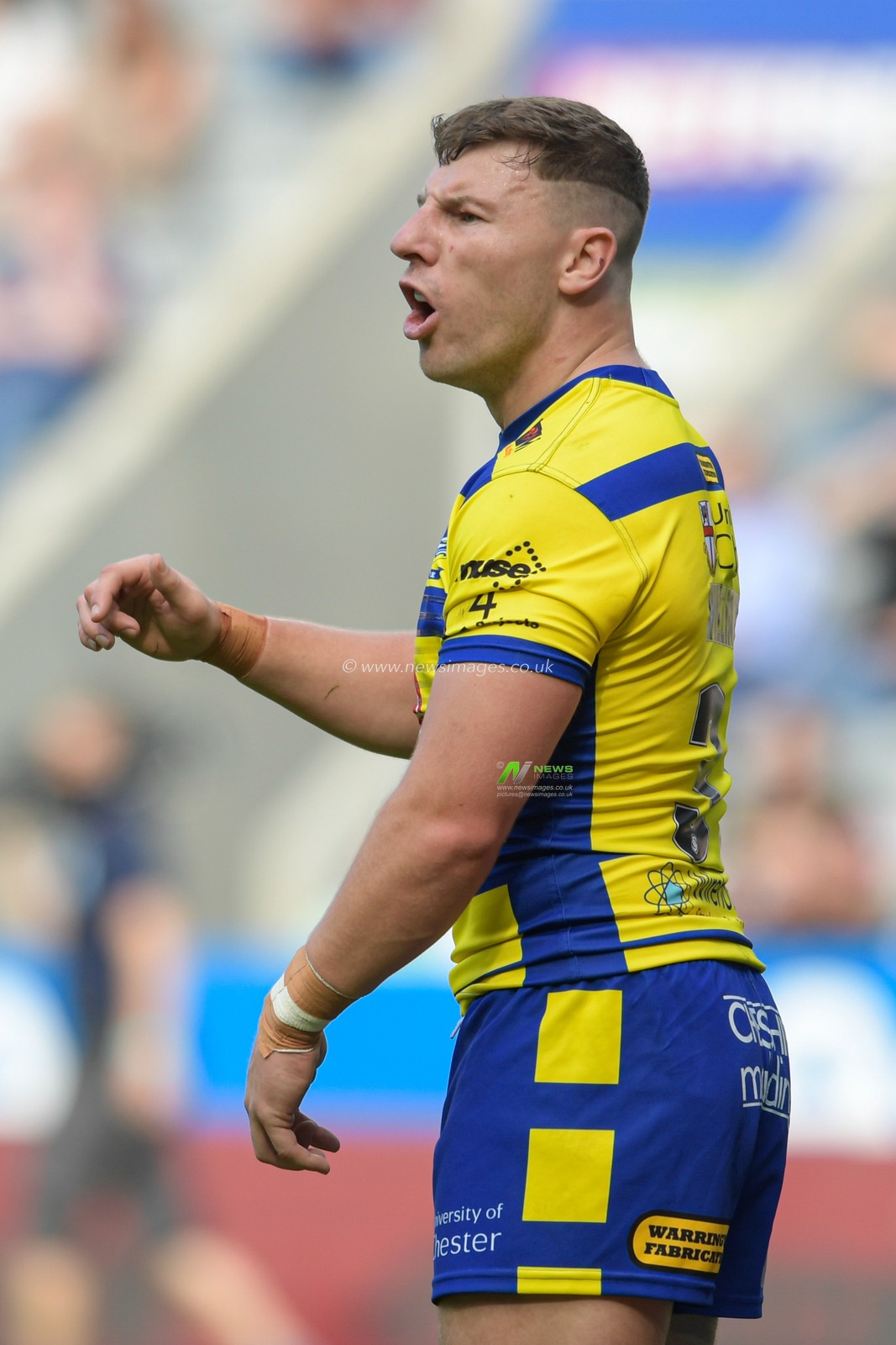 George Williams (31) of Warrington Wolves in action during the game