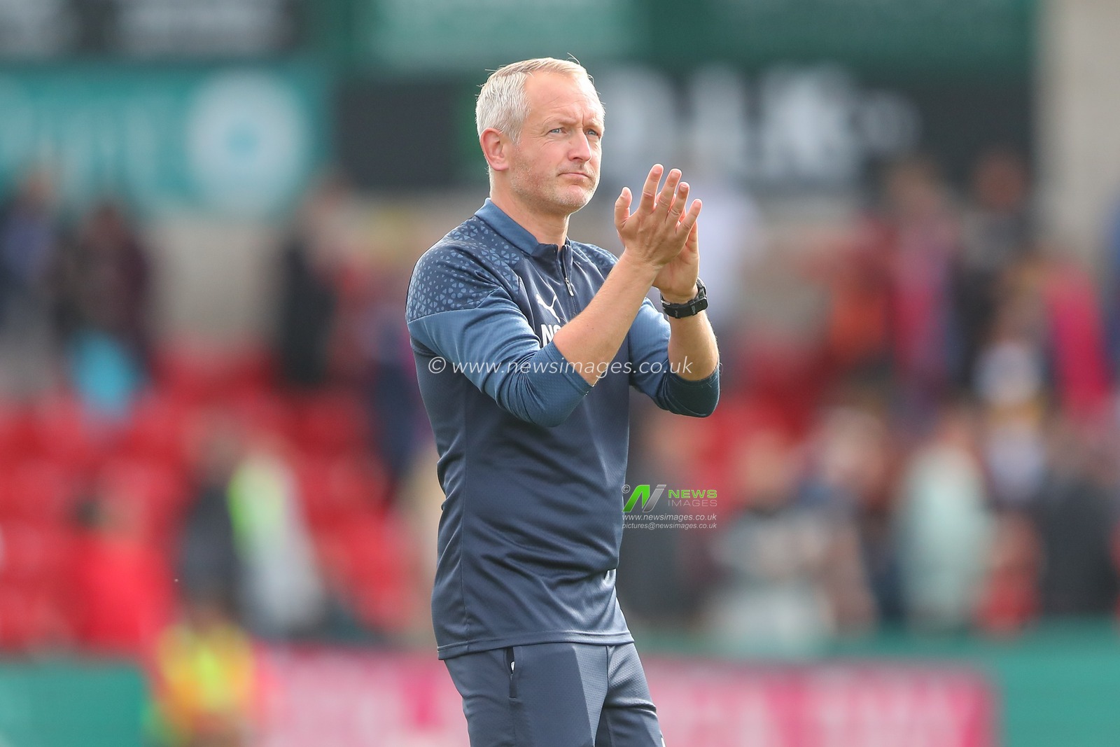 Neil Critchley manager of Blackpool applauds the travelling fans after the Sky Bet League 1 match Lincoln City vs Blackpool at Gelder Group Sincil Bank Stadium, Lincoln, United Kingdom, 26th August 2023

(Photo by Gareth Evans/News Images)