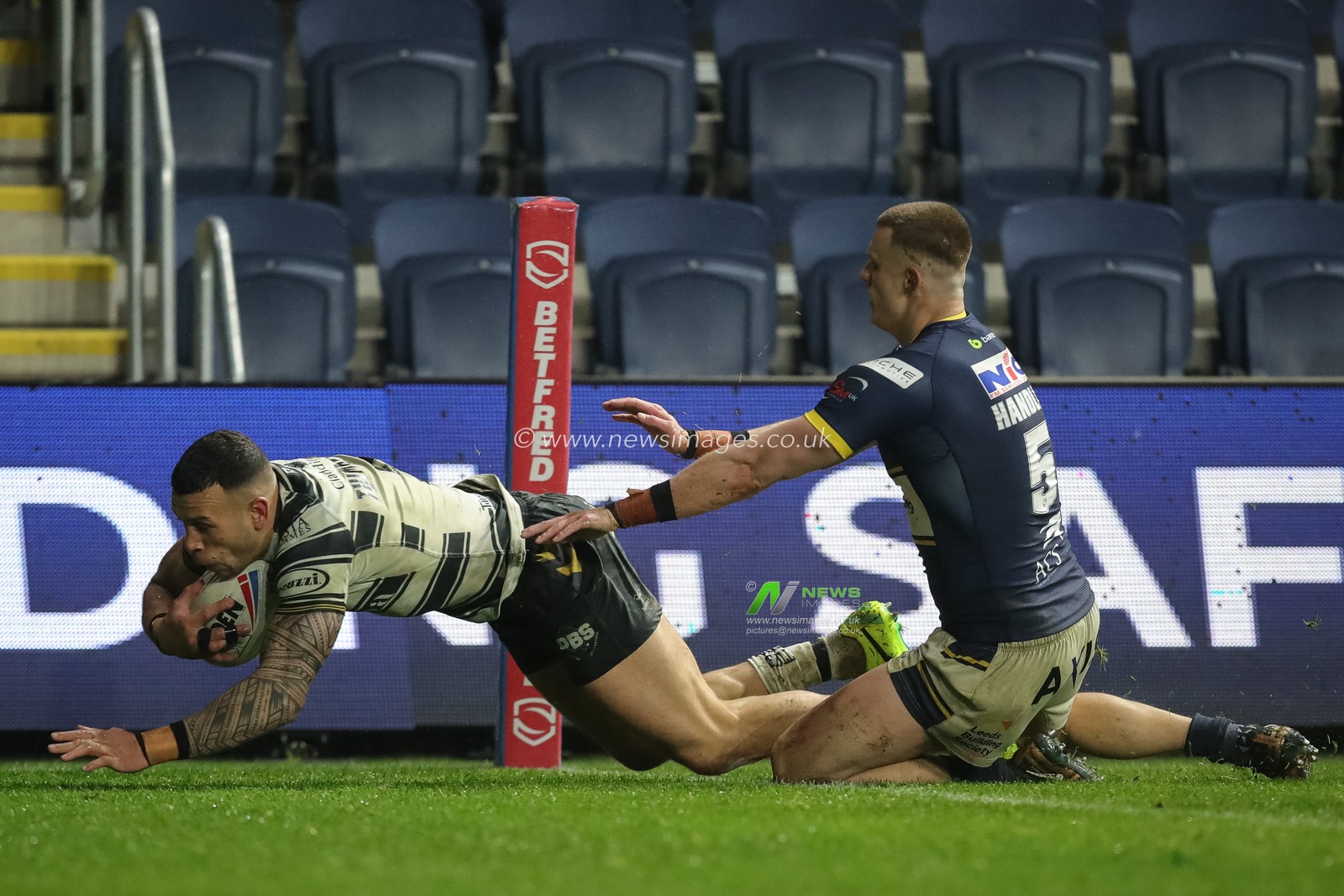 Carlos Tuimavave #3 of Hull FC goes over for a try and makes the score 30-4 in the second half of the Betfred Super League Round 9 match Leeds Rhinos vs Hull FC at Headingley Stadium, Leeds, United Kingdom, 14th April 2023

(Photo by James Heaton/News Images)