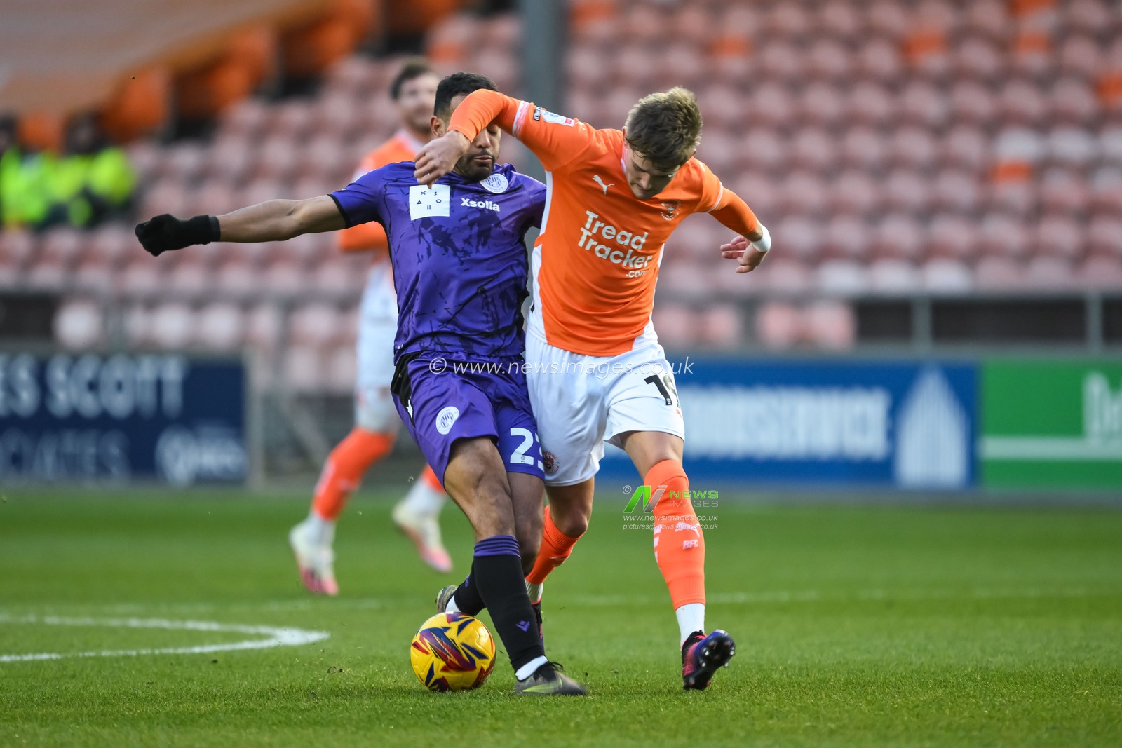 Dom Ballard of Blackpool is tackled by Louis Thompson of Stevenage during the Sky Bet League 1 match Blackpool vs Stevenage at Bloomfield Road, Blackpool, United Kingdom, 21st December 2024

(Photo by Craig Thomas/News Images)