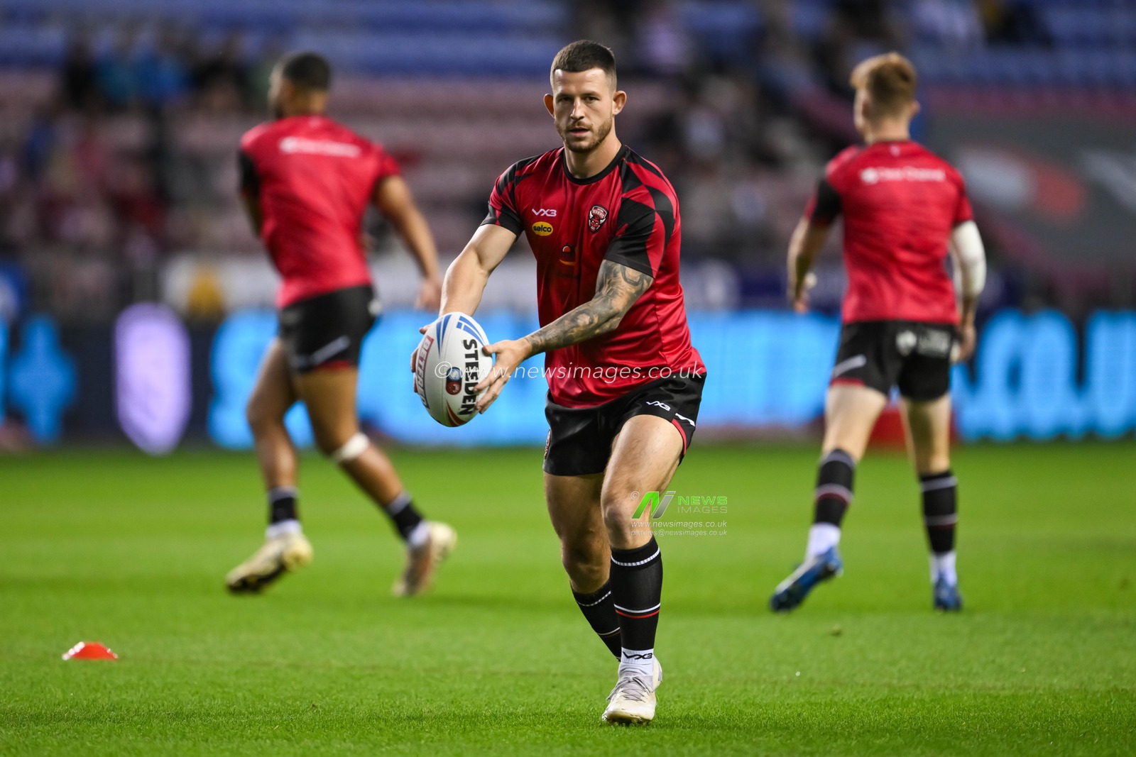 Cade Cust of Salford Red Devils during pre match warm up ahead of the Betfred Super League Round 27 match Wigan Warriors vs Salford Red Devils at The Brick Community Stadium, Wigan, United Kingdom, 19th September 2024

(Photo by Craig Thomas/News Images)
