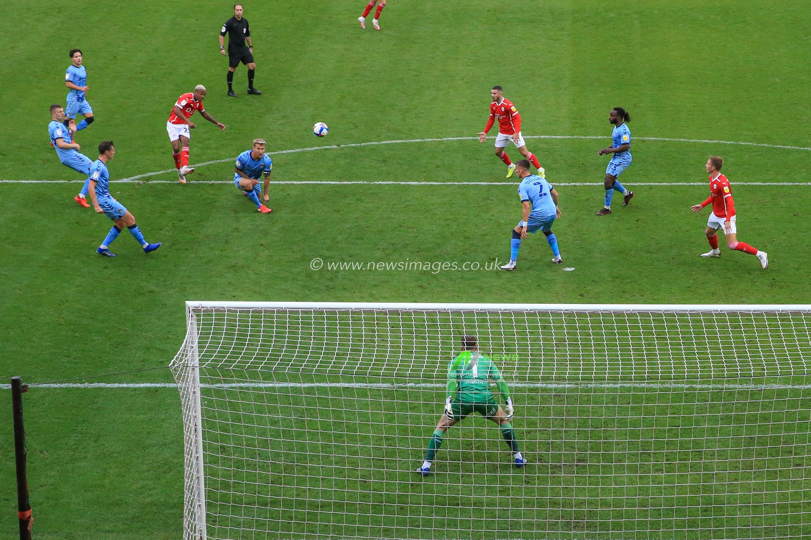 Elliot Simoes (23) of Barnsley shoots on goal and just puts it over the top fr corner, crossest effort of the game