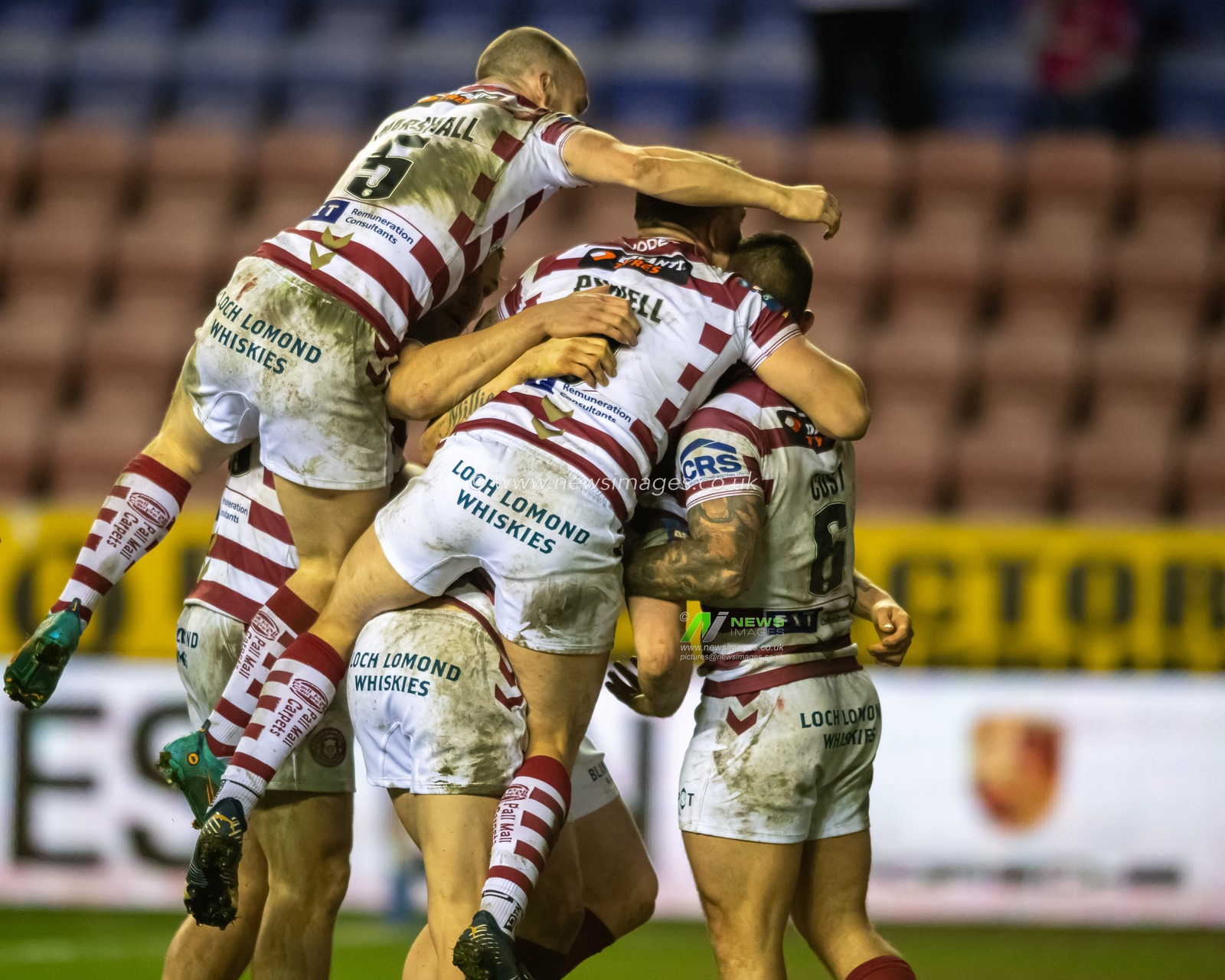 John Bateman #13 of Wigan Warriors celebrates scoring a try to make it 18-0