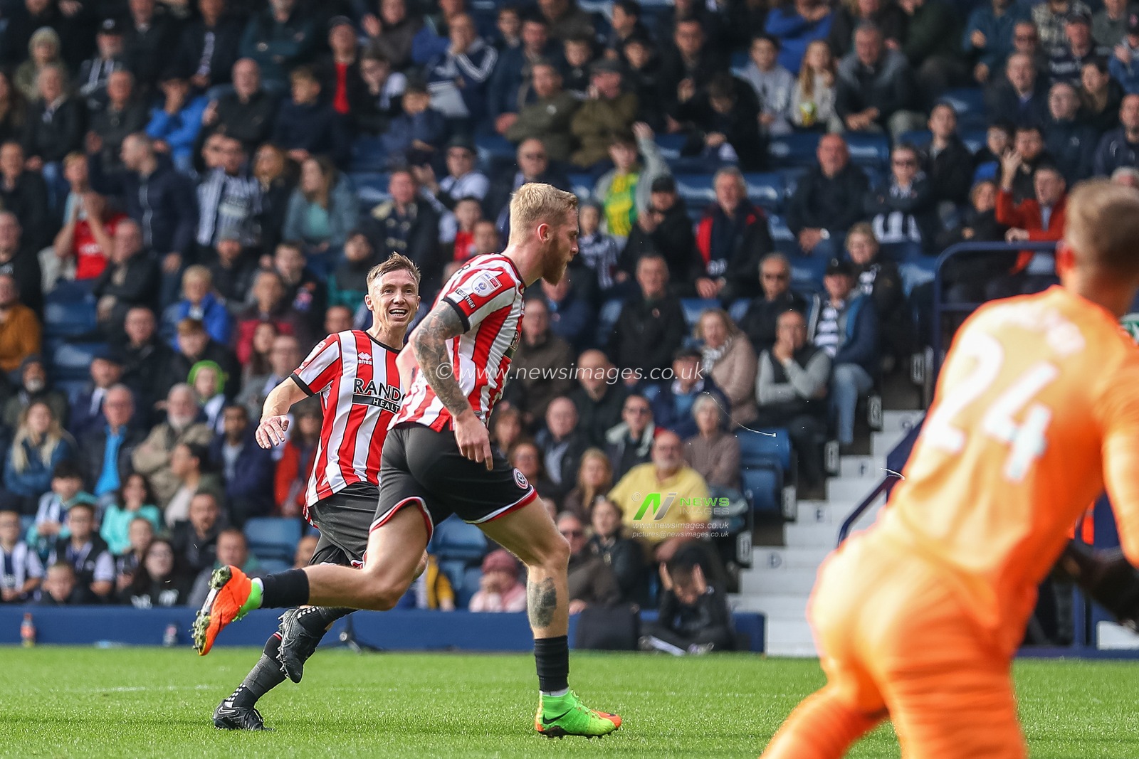 Oliver McBurnie #9 of Sheffield United celebrates his goal to make it 0-2 during the Sky Bet Championship match West Bromwich Albion vs Sheffield United at The Hawthorns, West Bromwich, United Kingdom, 29th October 2022

(Photo by Gareth Evans/News Images)