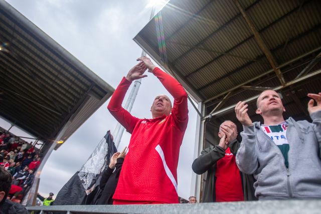 Wrexham fans celebrate at full time during the Sky Bet League 1 match Wrexham vs Stockport County at SToK Cae Ras, Wrexham, United Kingdom, 22nd March 2025

(Photo by Nik Mesney/News Images)
