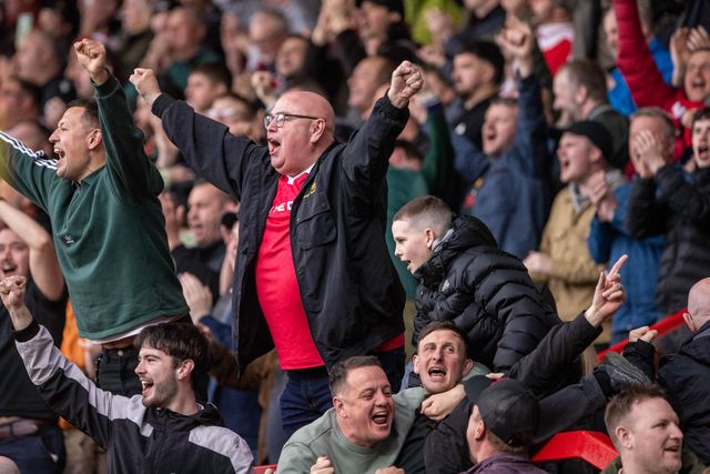 Wrexham fans celebrate their victory following the Sky Bet League 1 match Wrexham vs Stockport County at SToK Cae Ras, Wrexham, United Kingdom, 22nd March 2025

(Photo by Nik Mesney/News Images)