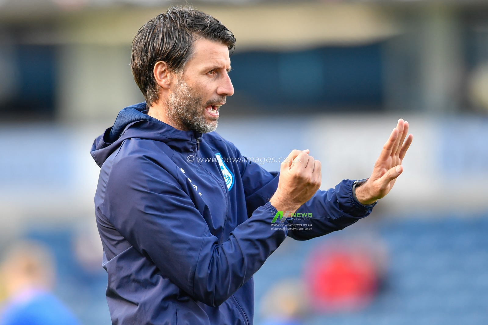 19th October 2019, Ewood Park, Blackburn, England; Sky Bet Championship, Blackburn Rovers v Huddersfield Town : Huddersfield Town Manager Danny Cowley gives instructions during the warm up

Credit: Simon Whitehead/News Images