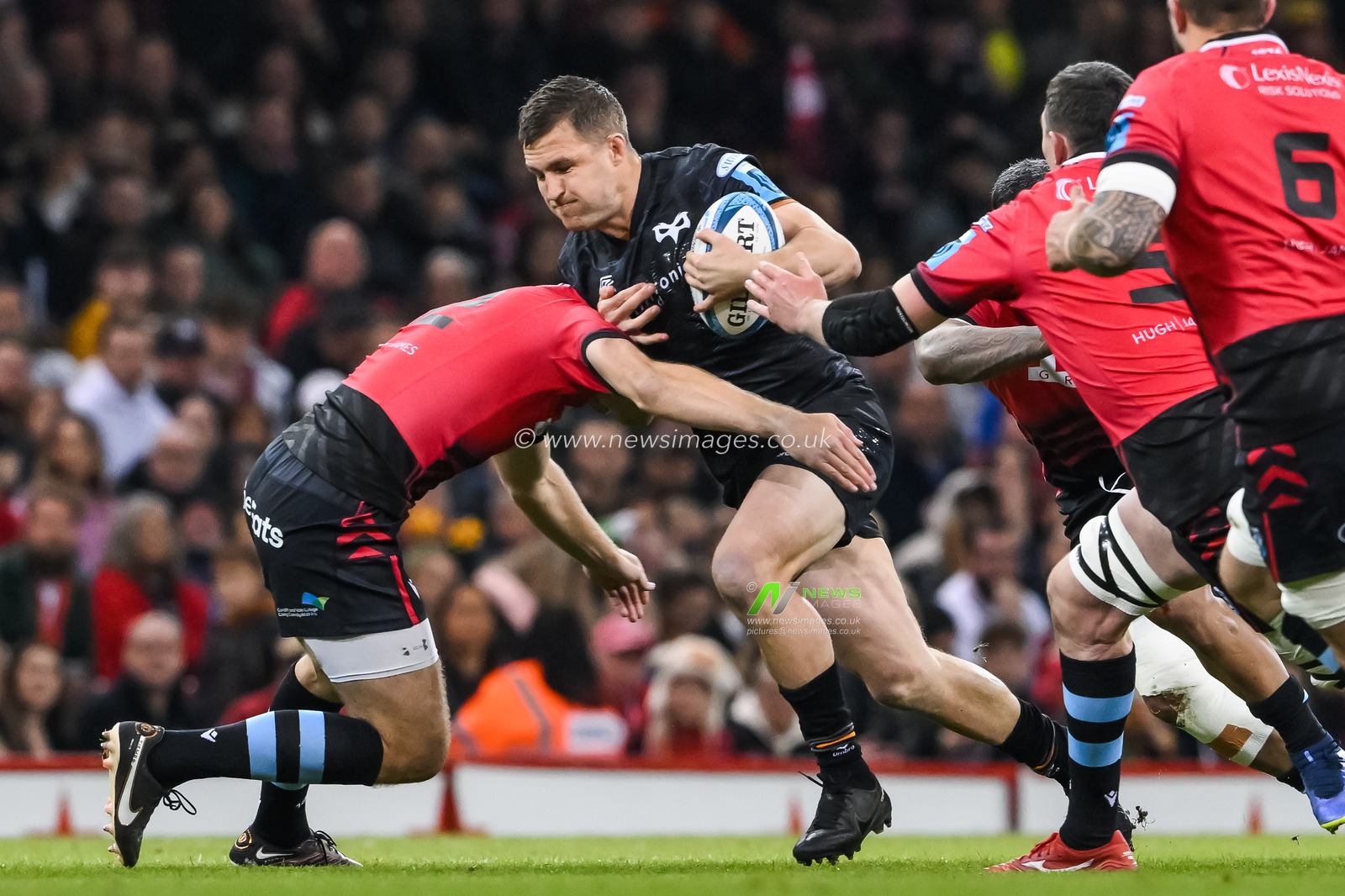 Michael Collins of Ospreys is tackled by Max Llewellyn of Cardiff during the United Rugby Championship match Ospreys vs Cardiff Rugby at Principality Stadium, Cardiff, United Kingdom, 22nd April 2023

(Photo by Craig Thomas/News Images)