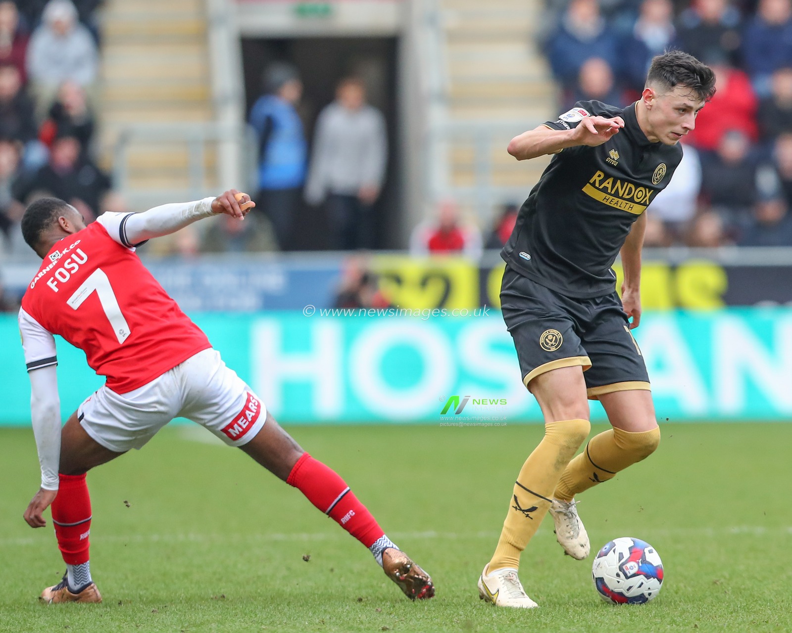 Anel AhmedhodÅ¾iÄ‡ #15 of Sheffield United gets away from a challenge from Tariqe Fosu #7 of Rotherham United during the Sky Bet Championship match Rotherham United vs Sheffield United at New York Stadium, Rotherham, United Kingdom, 4th February 2023

(Photo by Gareth Evans/News Images)