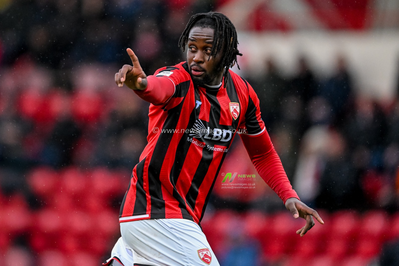 Admiral Muskwe of Morecambe points during the Enterprise National League match Morecambe vs Wealdstone  at Mazuma Stadium, Morecambe, United Kingdom, 20th September 2025

(Photo by Adam Gee/News Images)