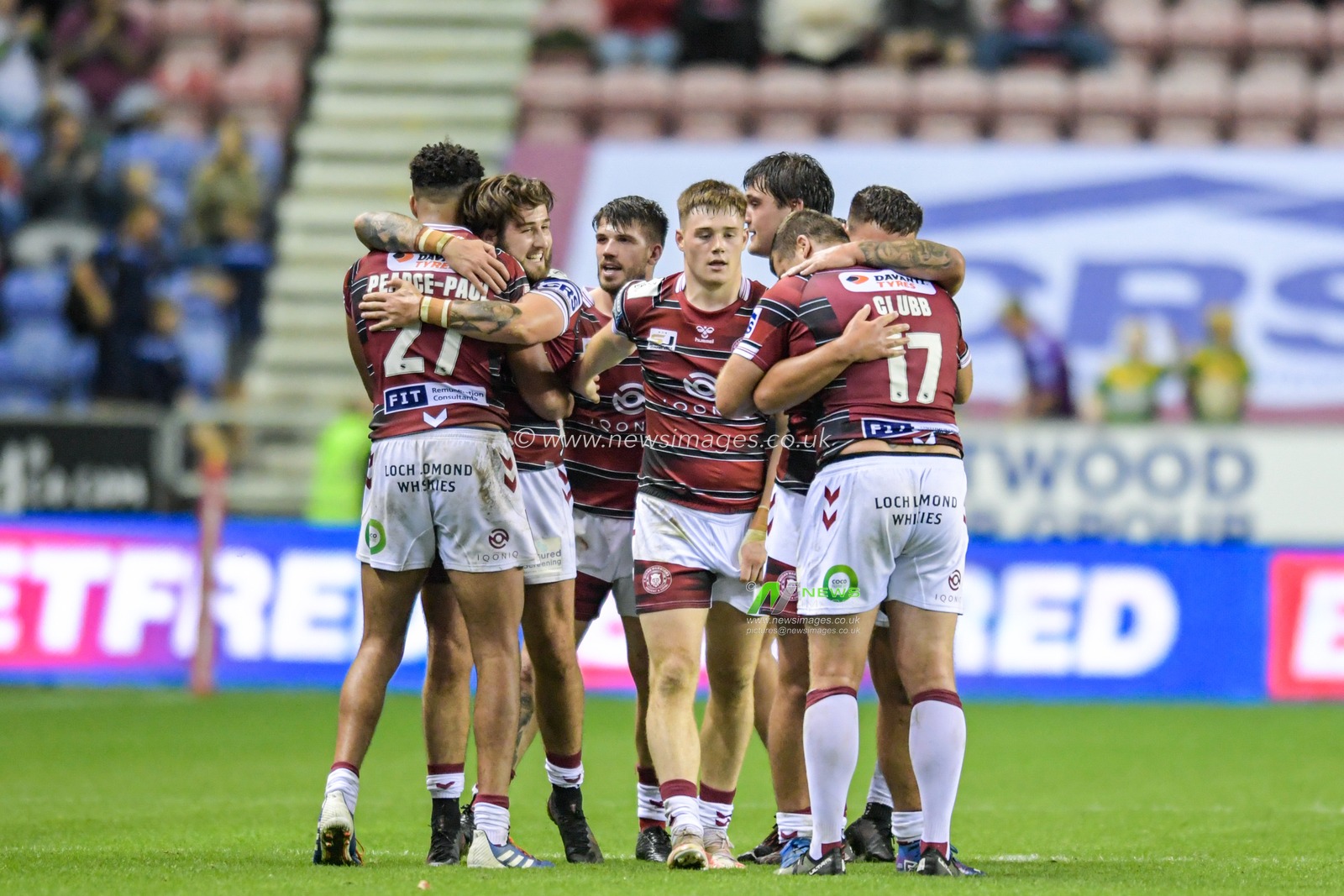 The Wigan Warriors players celebrate beating Catalans Dragons 12-8 at the final whistle