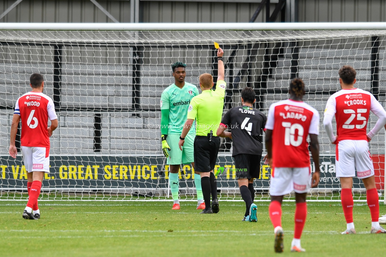 Jamal Blackman (27) of Rotherham United receives a yellow card after giving away a penalty