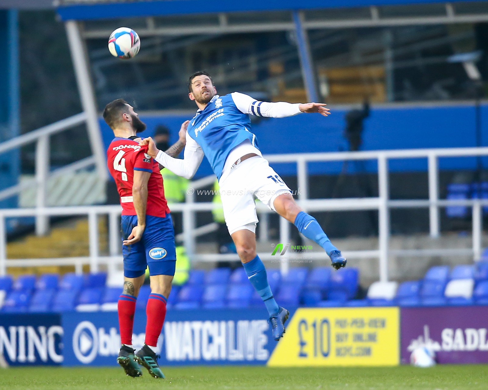 Lukas Jutkiewicz #10 of Birmingham City and Bradley Johnson #4 of Blackburn Rovers compete for the aerial ball