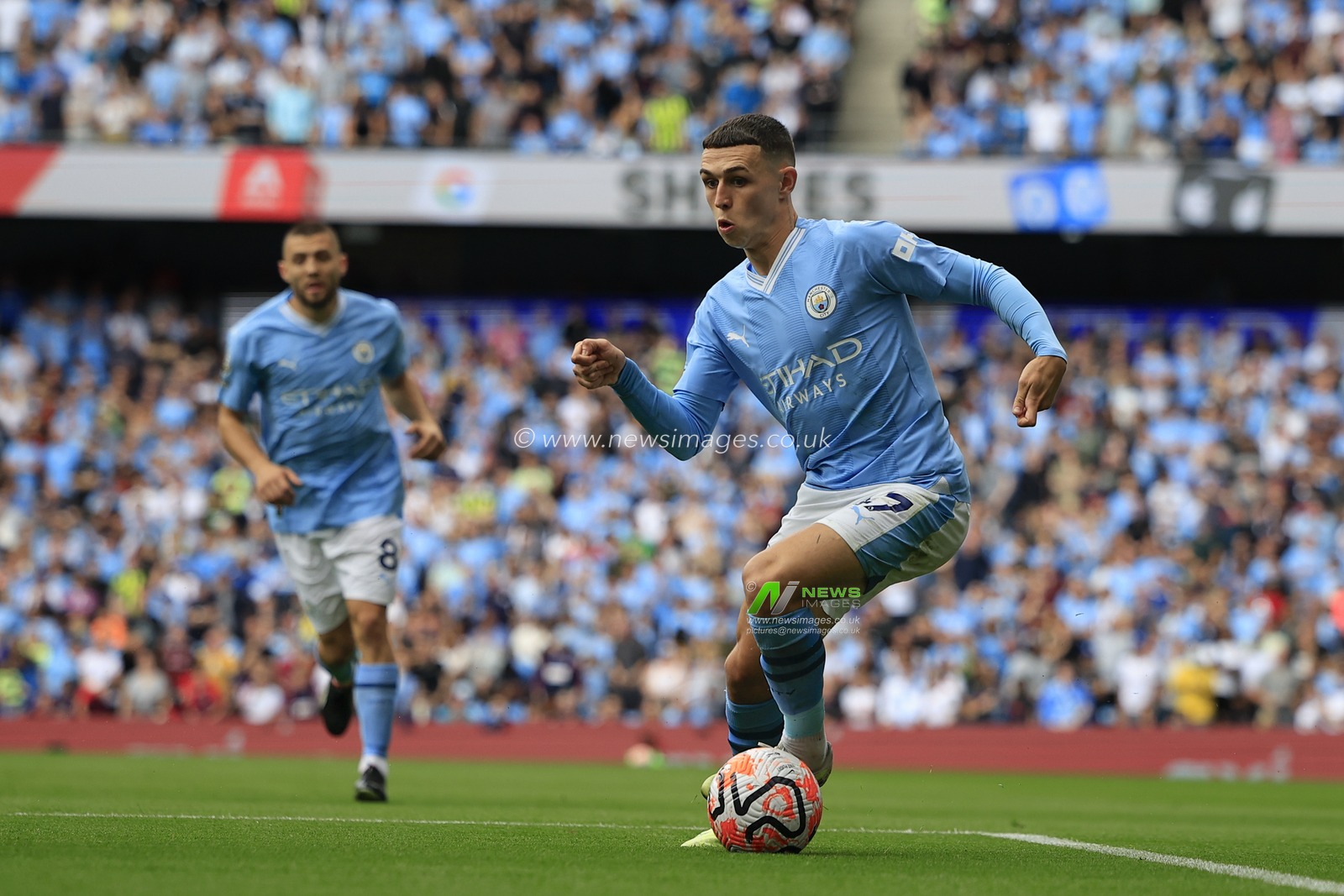 Phil Foden #47 of Manchester City runs with the ball during the Premier League match Manchester City vs Fulham at Etihad Stadium, Manchester, United Kingdom, 2nd September 2023

(Photo by Conor Molloy/News Images)