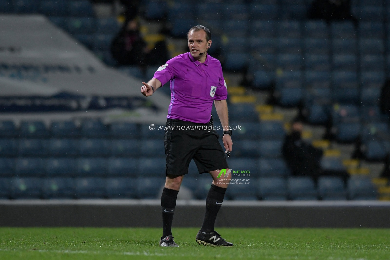 Referee Geoff Eltringham in action during the game