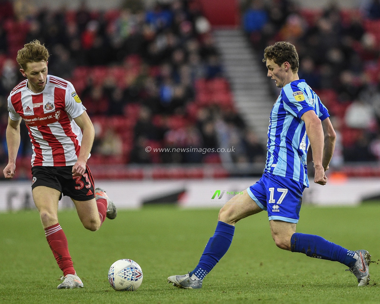 14th December 2019, Stadium Of Light, Sunderland, England; Sky Bet League 1, Sunderland v Blackpool : Matty Virtue (17) of Blackpool under pressure from Denver Hume (33) of Sunderland

Credit: Iam Burn/News Images