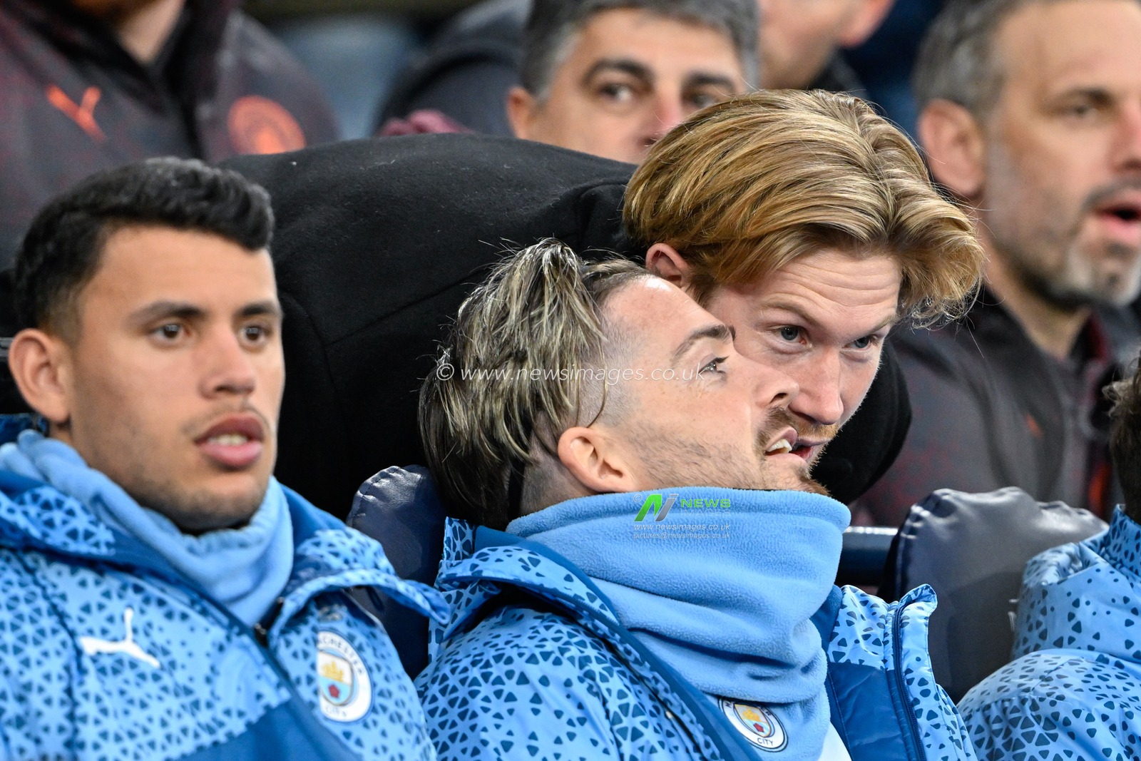 Jack Grealish of Manchester City speaks with Kevin De Bruyne of Manchester City while on the bench ahead of kick off, during the Emirates FA Cup Quarter- Final match Manchester City vs Newcastle United at Etihad Stadium, Manchester, United Kingdom, 16th March 2024

(Photo by Cody Froggatt/News Images)