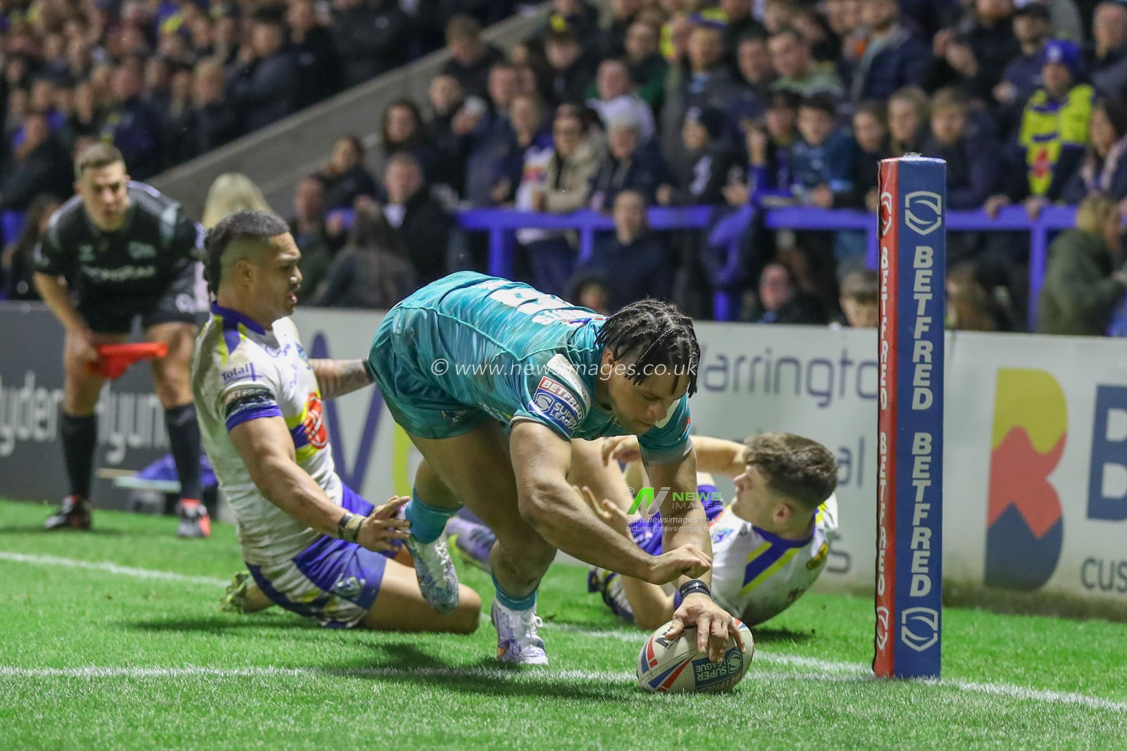 Derrell Olpherts #16 of Leeds Rhinos goes over for a try to make it 30-4 during the Betfred Super League Round 1 match Warrington Wolves vs Leeds Rhinos at Halliwell Jones Stadium, Warrington, United Kingdom, 16th February 2023

(Photo by Gareth Evans/News Images)