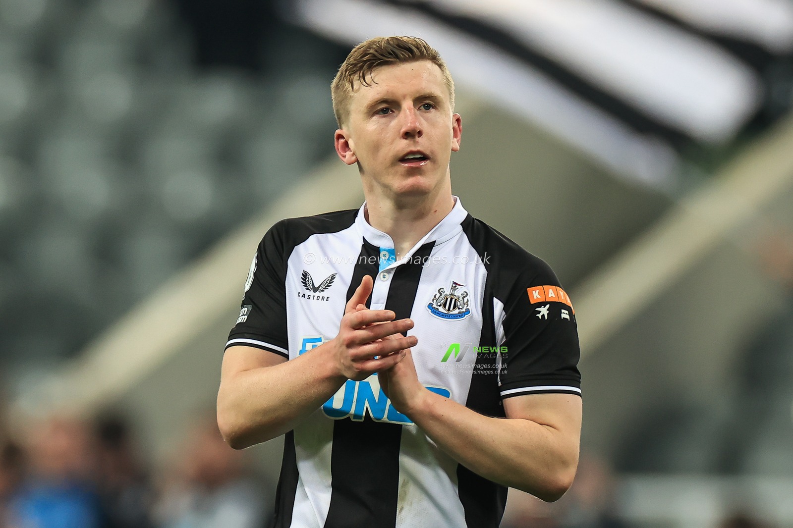 Matt Targett #13 of Newcastle United applauds the fans at the end of the game