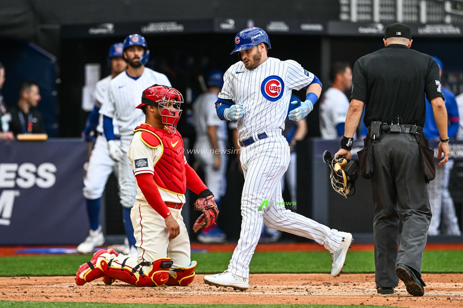 Ian Happ #8 of the Chicago Cubs cross home plate to score a run during the 2023 MLB London Series match St. Louis Cardinals vs Chicago Cubs at London Stadium, London, United Kingdom, 24th June 2023

(Photo by Craig Thomas/News Images)