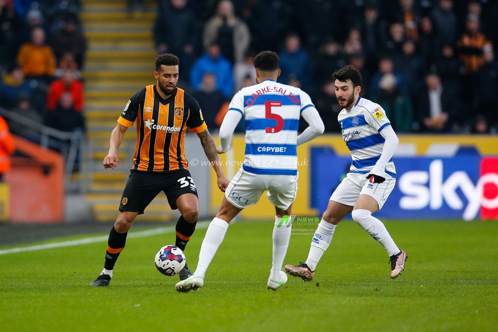 Cyrus Christie #33 of Hull City takes on Jake Clarke-Salter #5 of QPR and Ilias Chair #10 of QPR during the Sky Bet Championship match Hull City vs Queens Park Rangers at MKM Stadium, Hull, United Kingdom, 28th January 2023

(Photo by Ben Early/News Images)