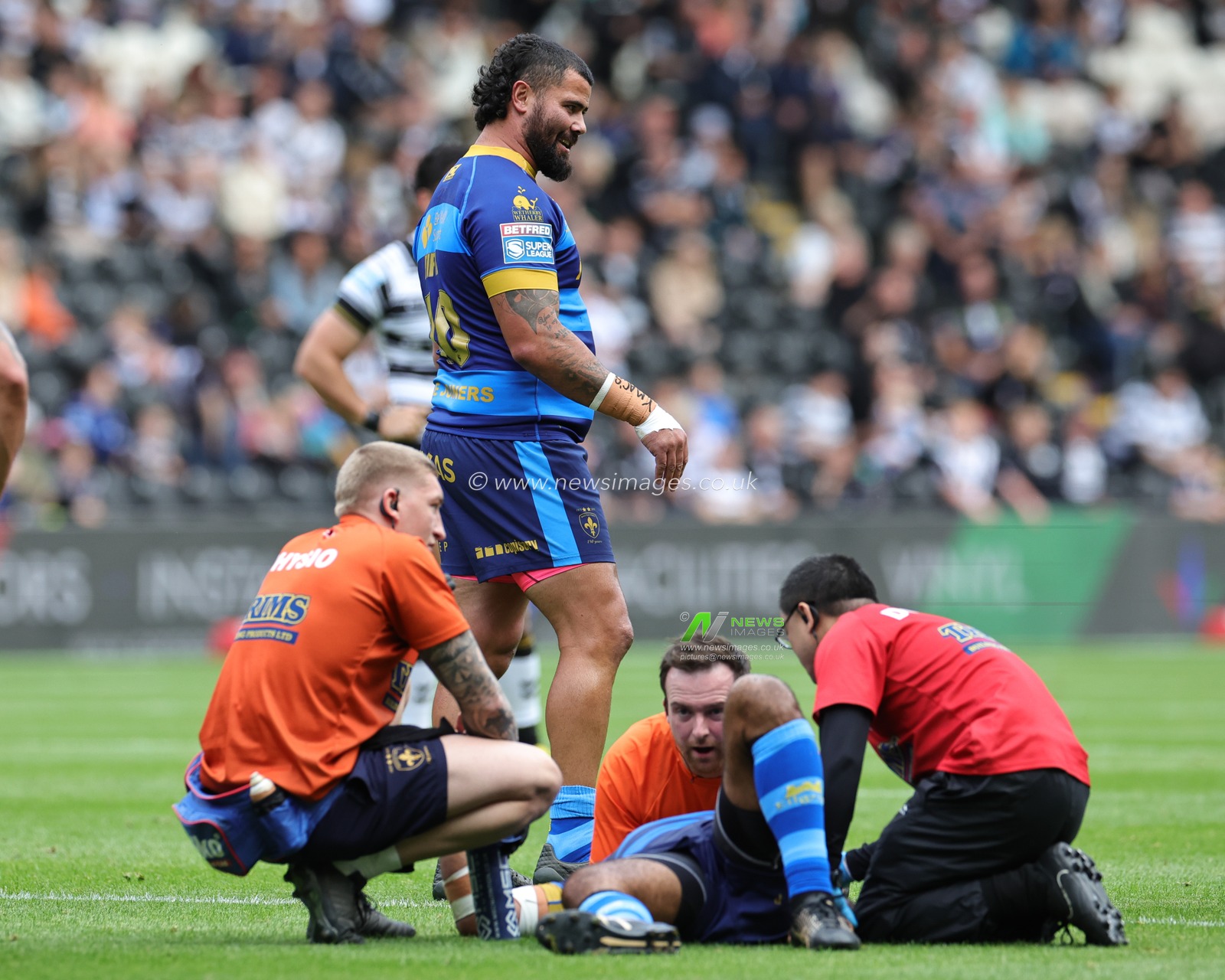 David Fifita #40 of Wakefield Trinity checks on team mate Samisoni Langi #21 of Wakefield Trinity during the Betfred Super League Round 21 match Hull FC vs Wakefield Trinity at MKM Stadium, Hull, United Kingdom, 6th August 2023

(Photo by Mark Cosgrove/News Images)