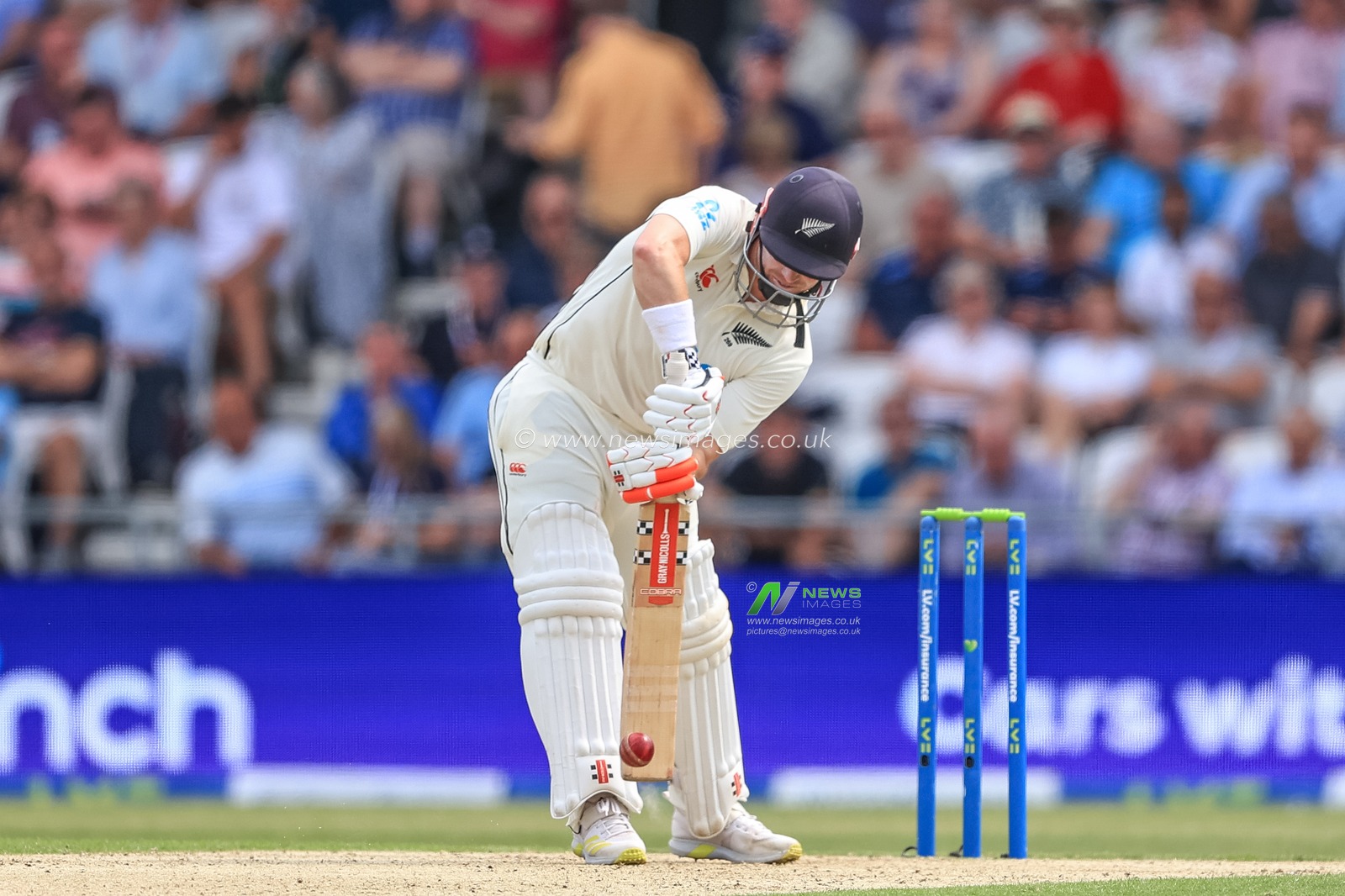 Henry Nicholls of New Zealand hits a four (4)