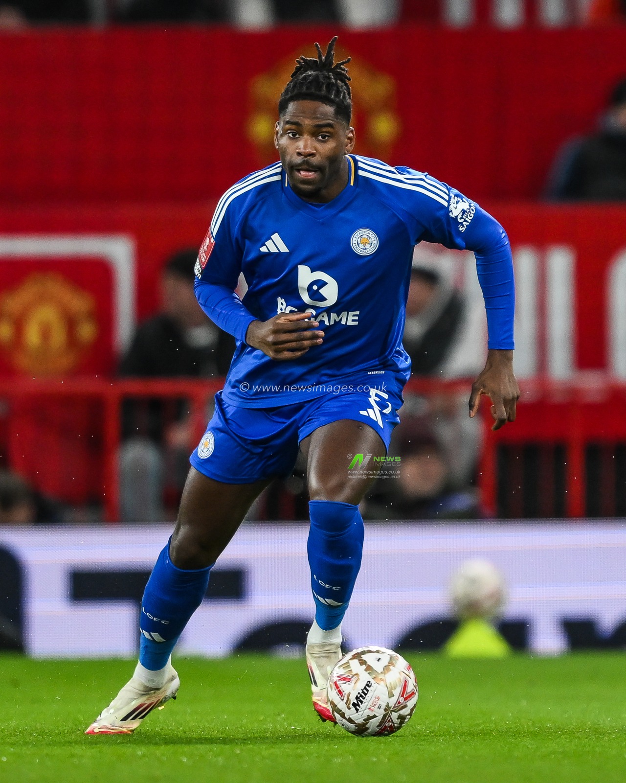 Caleb Okoli of Leicester City makes a break with the ball during the Emirates FA Cup Fourth Round match Manchester United vs Leicester City at Old Trafford, Manchester, United Kingdom, 7th February 2025

(Photo by Craig Thomas/News Images)