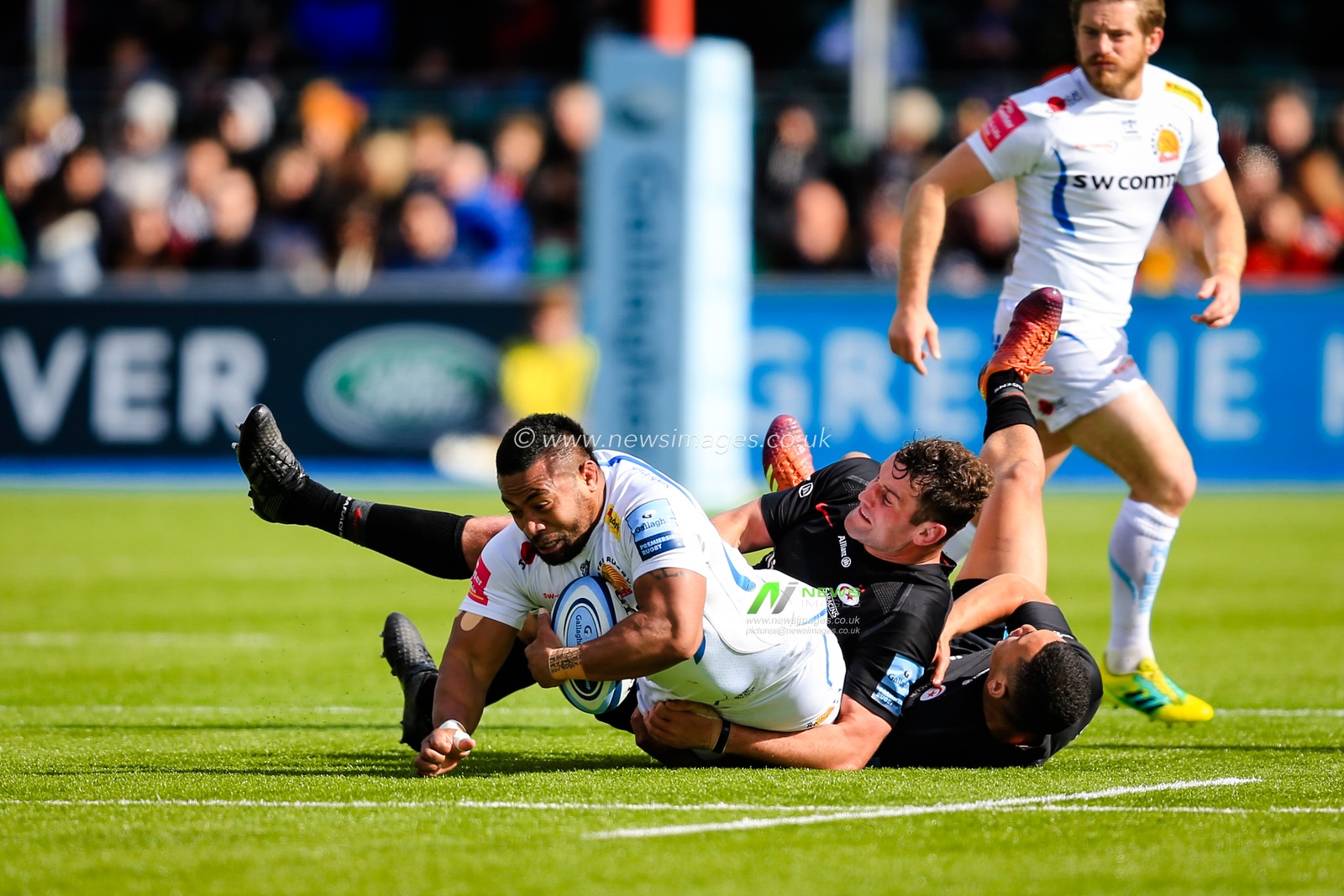 4th May 2019 , Allianz Park , London, England; Gallagher Premiership, Saracens vs Exeter Chiefs ;  Elvis Taione (16) of Exeter is tackled by Manu Vunipola (22) of Saracens


Credit: Georgie Kerr/News Images