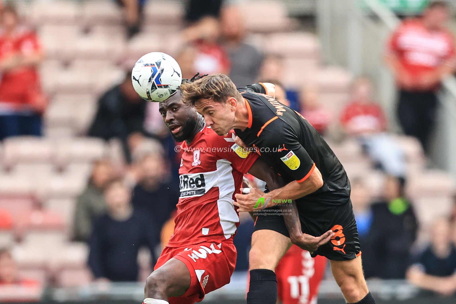 Ryan Wintle (8) Of Blackpool heads clear