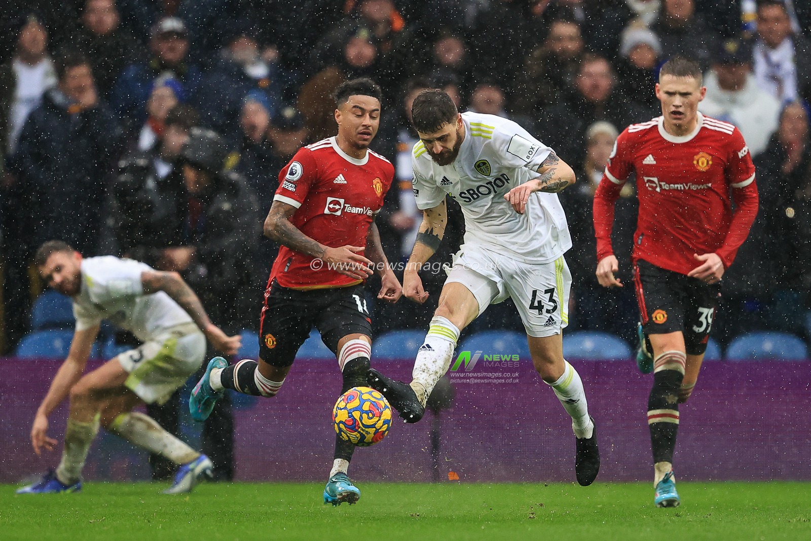 Mateusz Klich #43 of Leeds United clears the ball up field