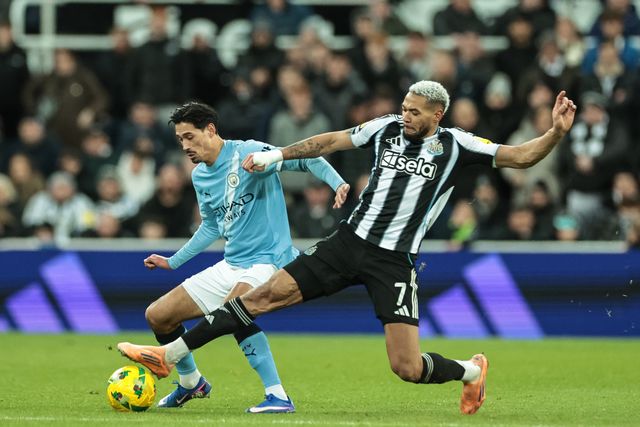 Tijjani Reijnders of Manchester City is tackled by Joelinton of Newcastle Untied during the Carabao Cup Semi-finals First Leg Newcastle United vs Manchester City at St. James's Park, Newcastle, United Kingdom, 13th January 2026

(Photo by Mark Cosgrove/News Images)