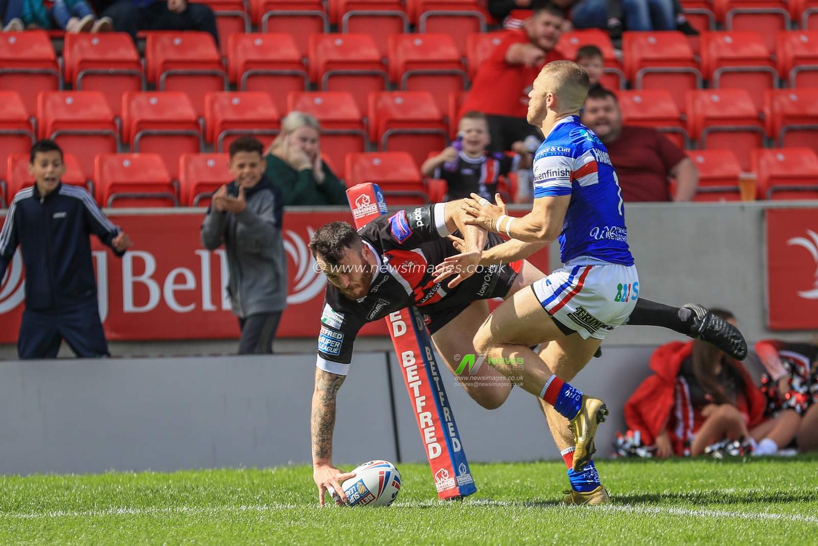 16th June 2019 ,  AJ Bell Stadium, Salford, England;  Betfred Super League, Round 18, Salford Red Devils vs Wakefield Trintiny ; Jake Bibby (5) of Salford Red Devils goes over for his second try 

Credit: Mark Cosgrove/News Images