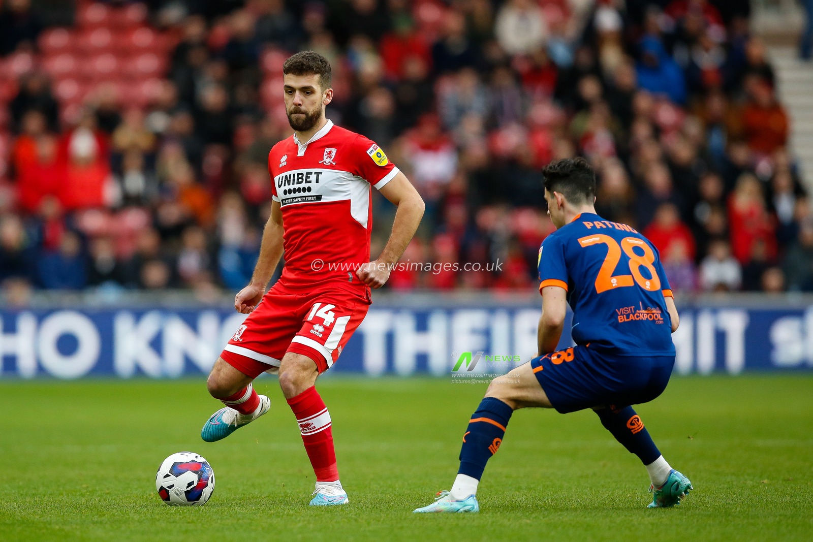 Tommy Smith #14 of Middlesbrough and Charlie Patino #28 of Blackpool during the Sky Bet Championship match Middlesbrough vs Blackpool at Riverside Stadium, Middlesbrough, United Kingdom, 4th February 2023

(Photo by Ben Early/News Images)