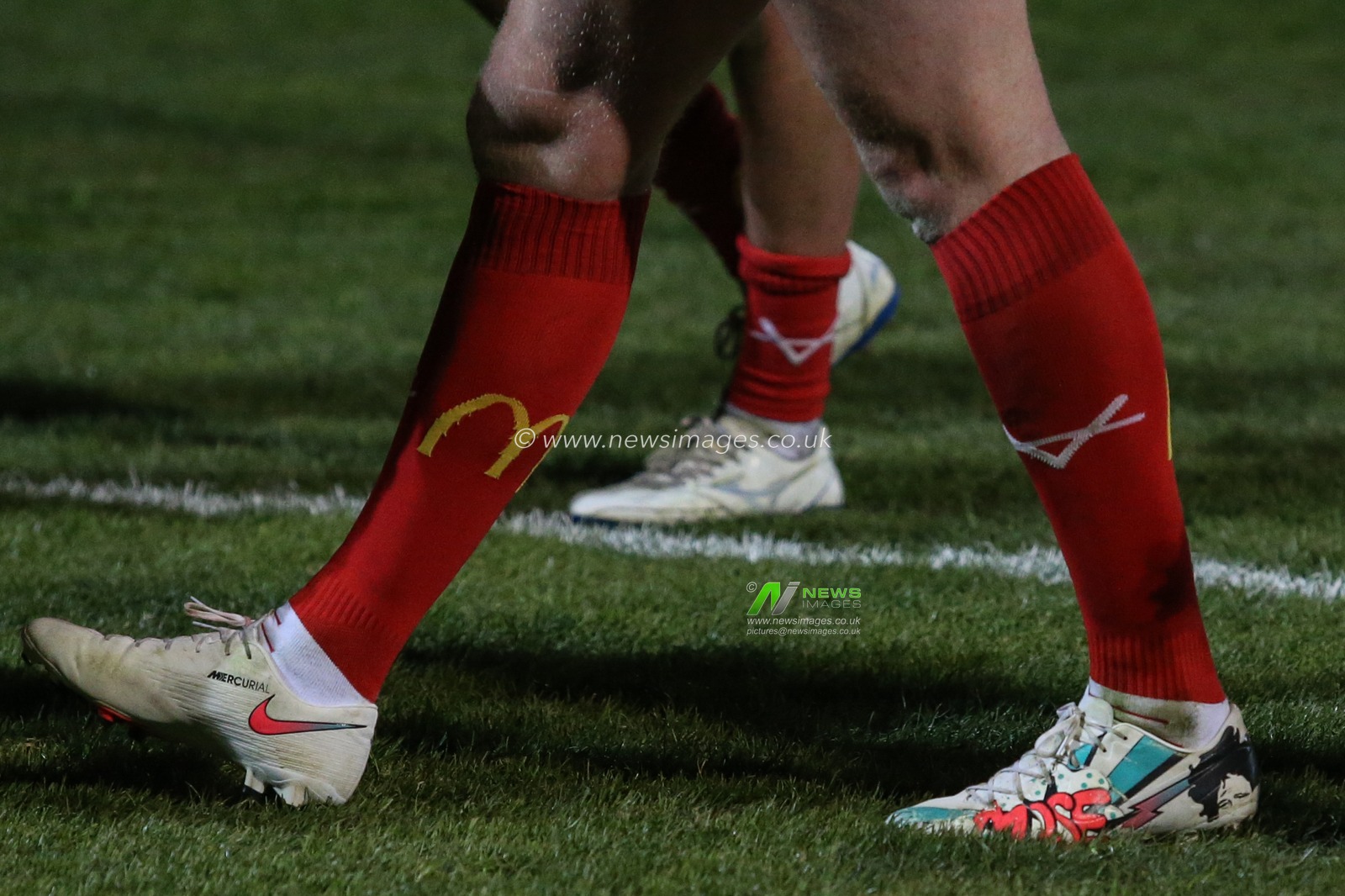 Dean Hadley (13) of Hull KR wearing boots to support Mose Masoe