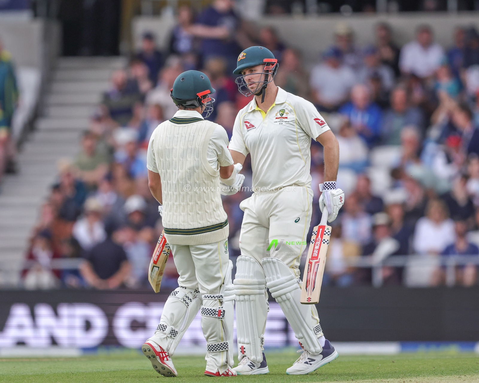 Travis Head of Australia congratulates Mitchell Marsh of Australia on his half century (50 runs) during the LV= Insurance Ashes Third Test Series Day 1 England v Australia at Headingley Stadium, Leeds, United Kingdom, 6th July 2023

(Photo by Mark Cosgrove/News Images)