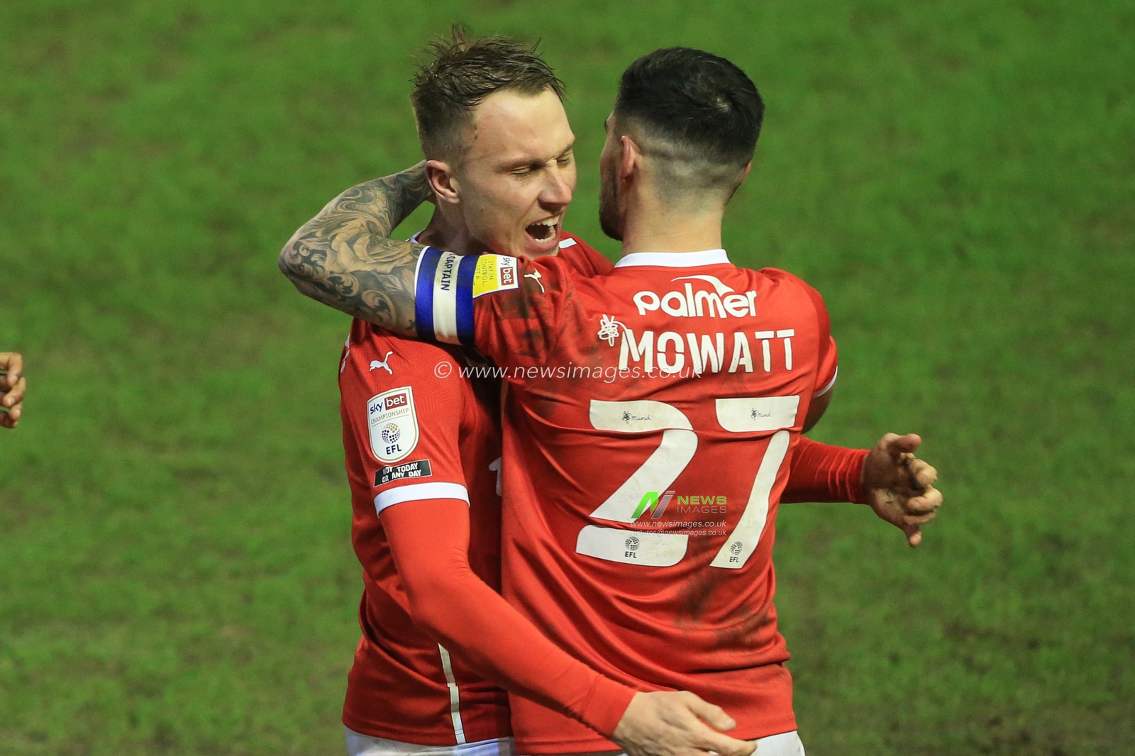 Cauley Woodrow #9 of Barnsley celebrates his goal to make it 2-0