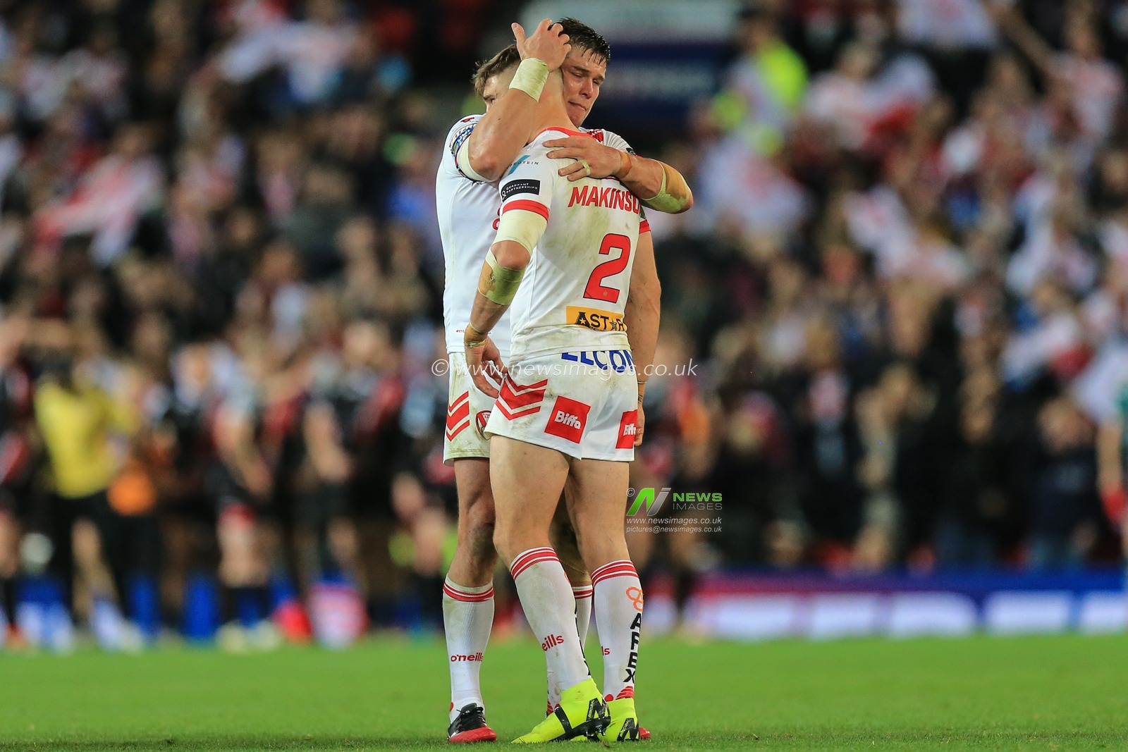 12th October 2019, Old Trafford, Manchester, England; The Grand Final 2019, Saint Helens v Salford Red Devils : Louie McCarthy-Scarsbrook (13) and Tommy Makinson (2) of St Helens after Mark Percival (4) of St Helens scores his try

Credit: David Greaves/News Images