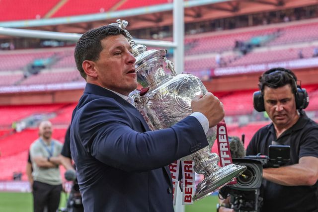 Matt Peet head coach of Wigan Warriors lifts the  Betfred Challenge Cup Trophy up to the fans as he celebrates the win during the Betfred Challenge Cup Final match Wigan Warriors vs Hull KR at Wembley Stadium, London, United Kingdom on 30 May 2026

(Photo by Mark Cosgrove/News Images)