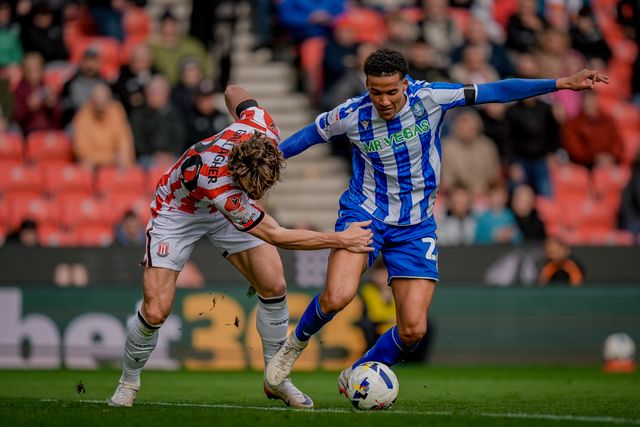 Sam Gallagher of Stoke City battles for the ball  with Gabriel Otegbayo of Sheffield Wednesday during the Sky Bet Championship match Stoke City vs Sheffield Wednesday at Bet365 Stadium, Stoke On Trent, United Kingdom on 03 April 2026

(Photo by Maynard Manyowa/News Images)