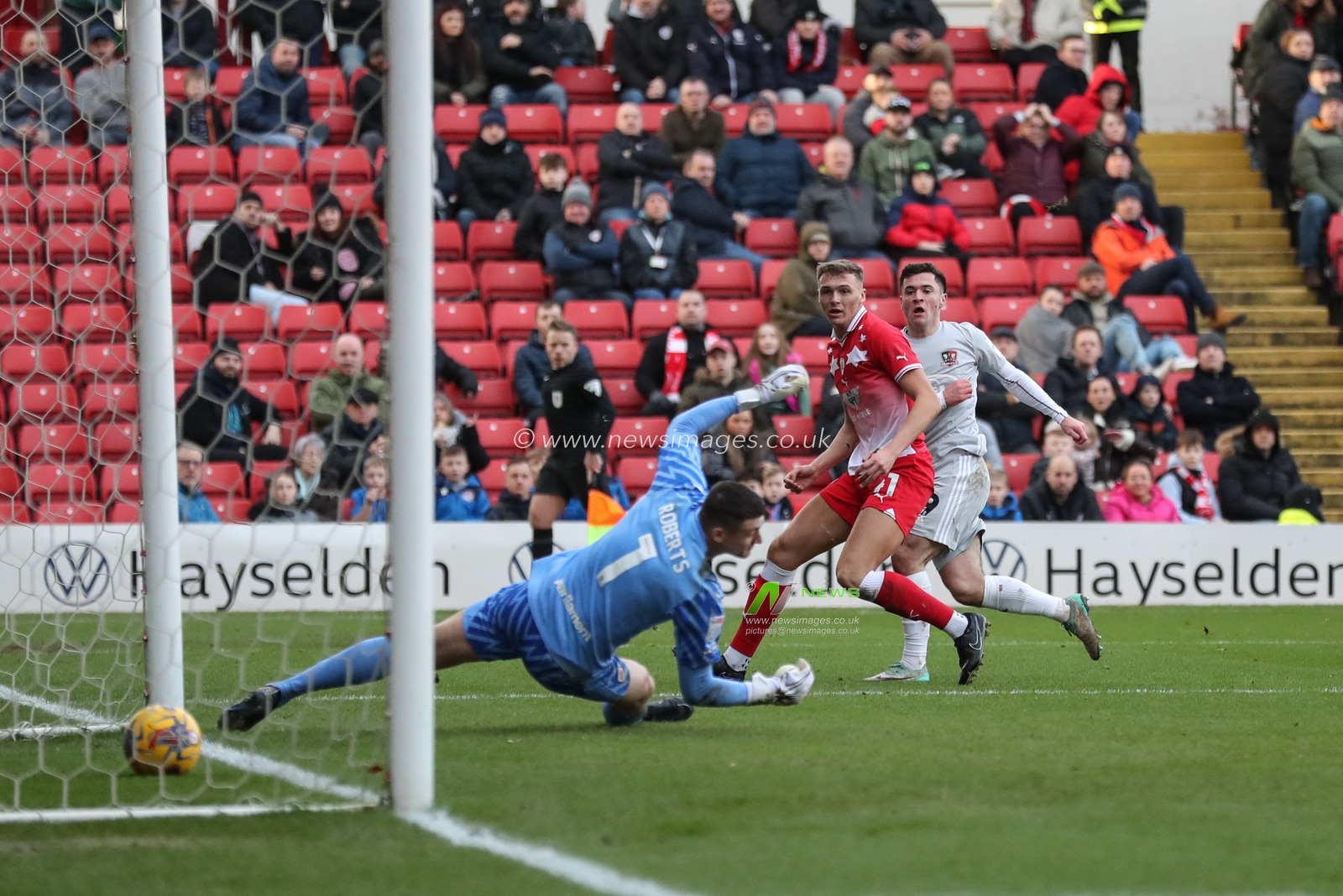 Jack Aitchison of Exeter City scores to make it 0-1 during the Sky Bet League 1 match Barnsley vs Exeter City at Oakwell, Barnsley, United Kingdom, 27th January 2024

(Photo by Alfie Cosgrove/News Images)