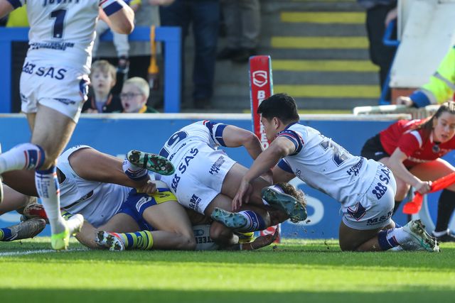 Arron Lindop of Warrington Wolves goes over for a try and makes the score 4-0 during the Betfred Super League Round 4 match Warrington Wolves vs Wakefield Trinity at Halliwell Jones Stadium, Warrington, United Kingdom, 9th March 2025

(Photo by Gareth Evans/News Images)